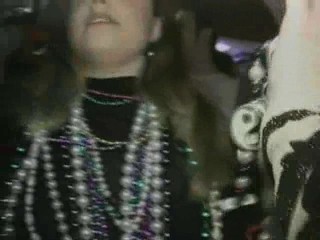 busty girl shows boobs at Mardi Gras