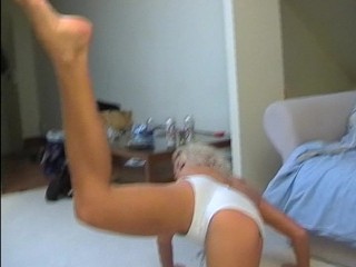 blonde girl exposes pussy lips and toes