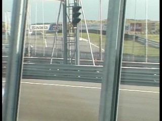 Sexy race fan makes a pit stop 1/6